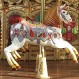 Inauguran carrusel de tres pisos en balneario: Reviva la historia de este tradicional juego