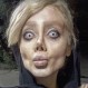 La terrorífica doble de Angelina Jolie, comparada con un zombie, mostró su verdadero rostro