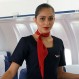 Azafata hizo todo por hacer reír a los pasajeros: Se introdujo en el compartimiento de equipajes
