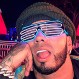 Anuel AA ríe y se ejercita sobre sus lujosos autos: Fans lo critican y le reprochan falta de humildad