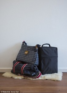 3074F35D00000578-3411528-She_is_bringing_three_bags_with_her_for_her_delivery-a-87_1453468925810