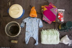 3074F52300000578-3411528-Agnes_packed_clothes_for_the_baby_a_blanket_and_hat_a_basin_for_-a-89_1453468925884