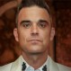 El extraño trastorno que llevó a engordar a Robbie Williams hasta perder su físico musculoso