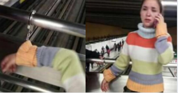 Se puede ver claramente las esposas y la mujer capturada en la Estación del metro Santa Isabel. Foto Facebook Camila Belén.
