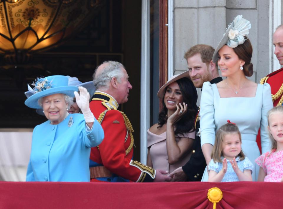 príncipe Carlos Meghan Markle