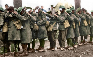 British 55th Division troops blinded by tear gas await treatment at an advanced dressing station near Bethune during the Battle of Estaires on April 10, 1918.