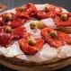 Pizza al estilo argentino: El manjar popular que crece por el mundo al compás de las crisis económicas