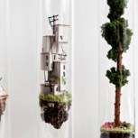 Fascinantes viviendas dentro de tubos de ensayo de vidrio creados por Rosa de Jong