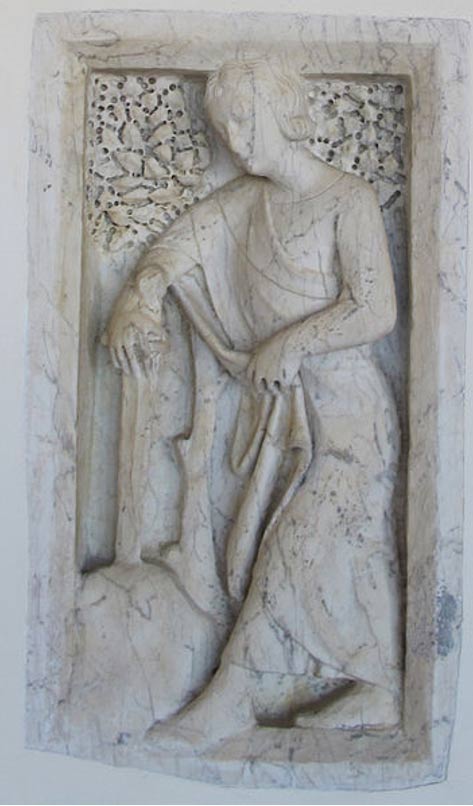 Escultura expuesta en la Pinacoteca Nacional de Italia, en Siena, que muestra a San Galgano clavando la espada en la piedra. 