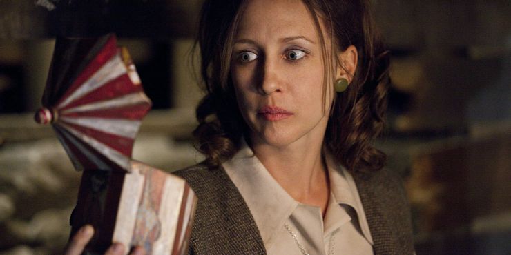 Lorraine-Warren-looking-into-the-music-box-with-wide-eyes-in-The-Conjuring-2013