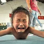 Fotos del brutal entrenamiento a niños chinos que aspiran a ser deportistas de elite
