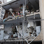Nueva oleada de misiles iraníes a Israel: Fotos del desolador escenario en un barrio residencial