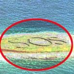 SOS gigante en un islote salvó a un grupo de buzos náufragos en Australia