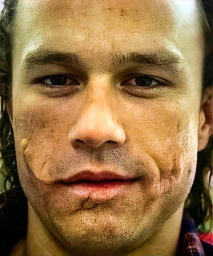 Heath Ledger test photo with Joker prosthetics but no makeup.  15 Genius Details You Probably Missed In the Popular Movie