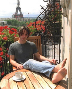 Keanu Reeves enjoying a coffee in Paris, 2003.