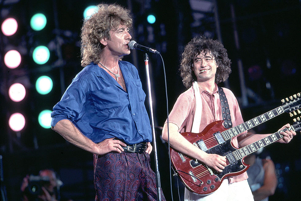 Robert Plant y Jimmy Page durante su controvertida presentación en el Live Aid 1985.