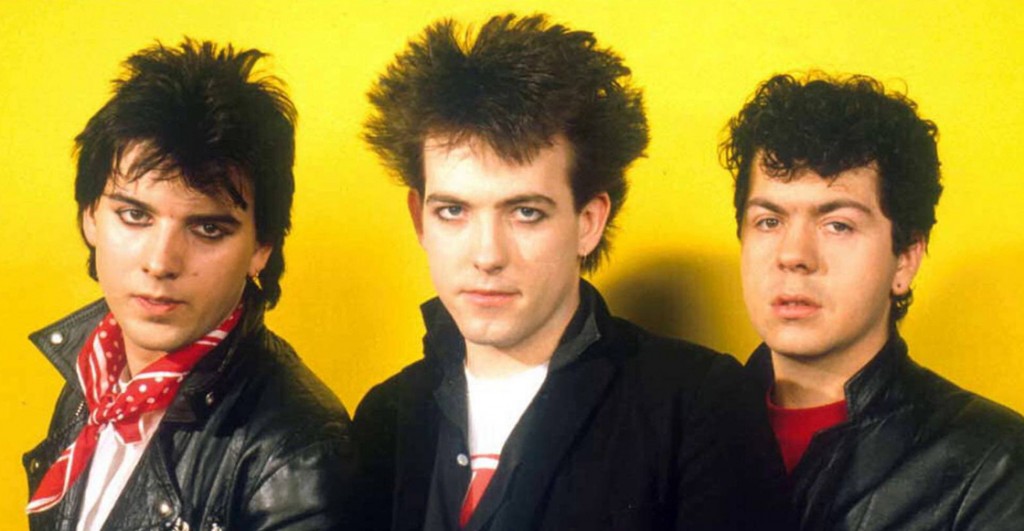 Simon Gallup, Robert Smith y Lawrence “Lol” Tolhurst, los tres integrantes de la primera formación clásica de The Cure. 