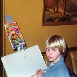 Un pequeño Kurt Cobain pintando en un caballete que recibió como regalo de sus abuelos paternos, con motivo de su octavo cumpleaños.