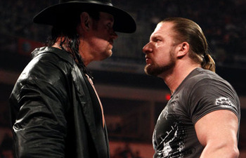 Un día como hoy: 23 y 24 de Agosto Triple-H-vs-Undertaker-Wrestlemania