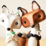 Adorables pequeñas fieras para adornar tu torta de novios