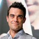 Robbie Williams muestra radical cambio de look: Video presenta su particular estilo