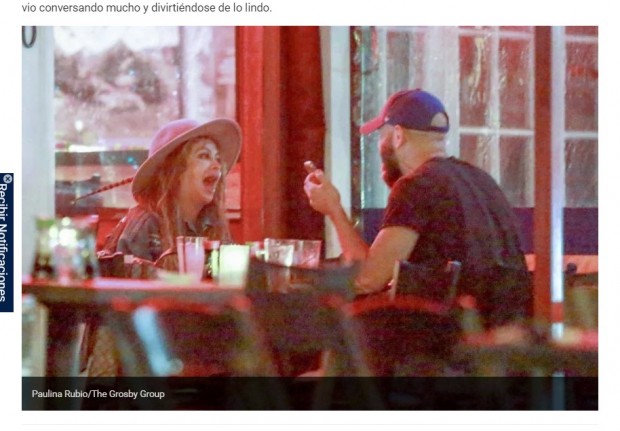 Paulina Rubio, riéndose junto a un misterioso hombre en un local de Miami / Captura laopinion.com