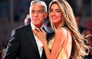 Amal Clooney opaca a George con espectacular vestido blanco
