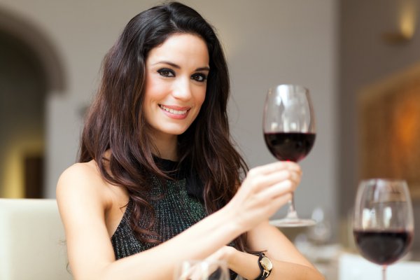 depositphotos_109110748-stock-photo-woman-drinking-wine-at-restaurant